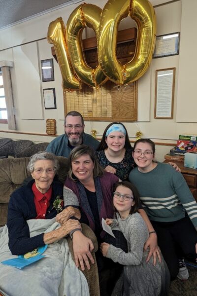 Tabatha and her family celebrate her grandma's 100th birthday in 2023.